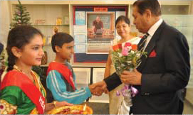 Mr. Borde being welcomed by the Head Boy & Head Girl of GIIS Surat