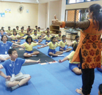 Students and staff from Dalian Pei Geng Primary attend interactive Yoga session