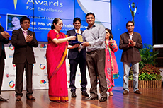 HE Ms Vijay Thakur Singh presenting Mr Love Rustagi the Dr LM Singhvi GIIS Ambassador Award