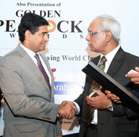 Mr Kaustubh Bodhankar being congratulated by H. E. Hon. Sayyad Abd–Al-Cader Sayed–Hossen, Minister of Industry, Commerce and Consumer Protection, Govt. of Mauritius