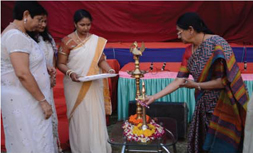Chief Guest Dr. Kalapana Desai lighting the lamp of knowledge