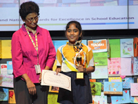 One of the prize winners with Ms Sheela Karia