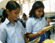 Students browsing library books