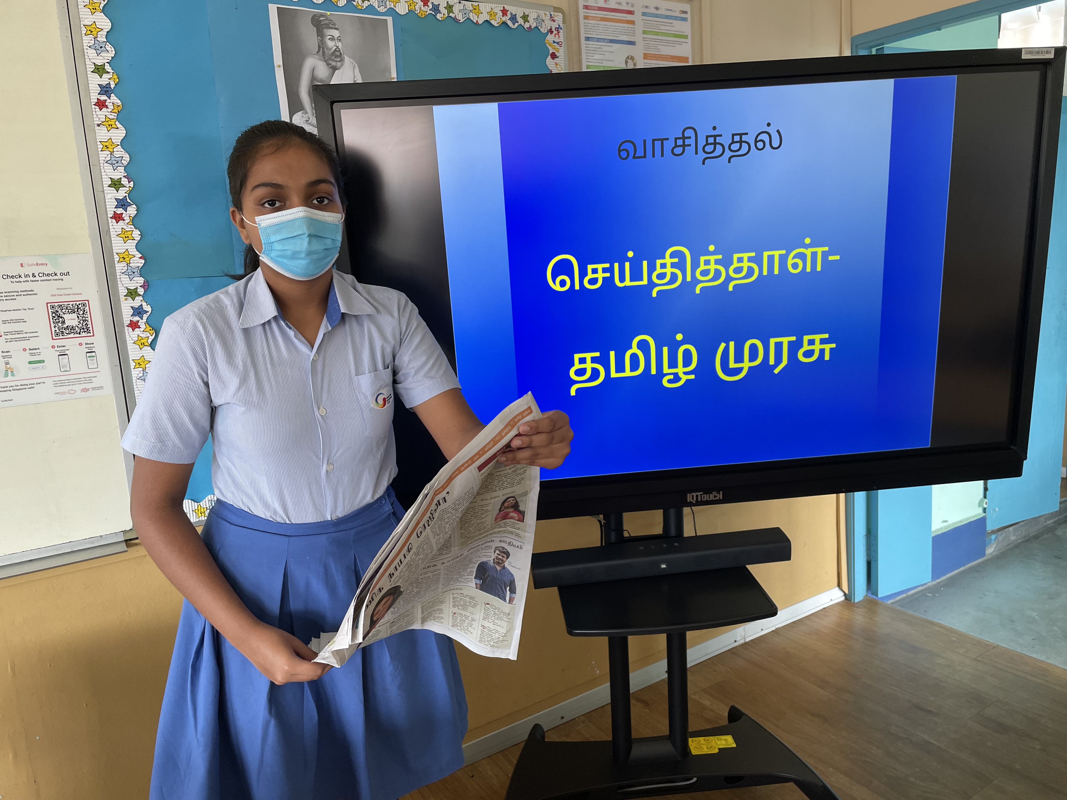 Student presents the history of Tamil language during the literary week