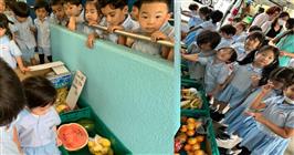 GIIS Tokyo Kindergarten students explore healthy food with a vegetable vendor
