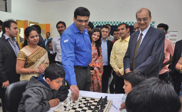 Grand Master Viswanathan Anand 5 times world champion of chess playing a dual game with GIIS students