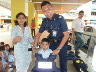 Demonstrating the use of Policeman jacket