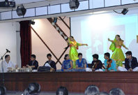 Students giving a presentation on Kathak