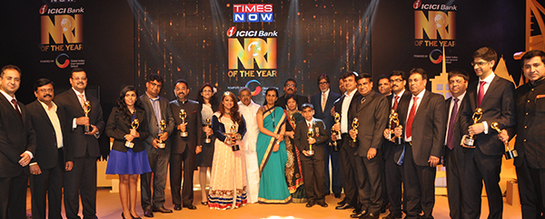 NRI of the Year Award winners including GIIS student Aastha Chouhan, with Hon@aps@ble Mr Vayalar Ravi, Ms Chanda Kochhar, Mr Amitabh Bacchan and Mr Atul Temurnikar