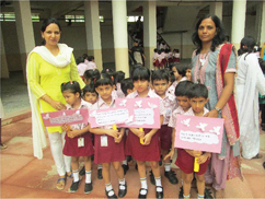 Pre-primary students demonstrating for world peace