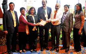 Mr Rajiv Vasudeva, Ms Sheela Karia, Ms Meenakshi Mehta, Mr BG Shenoy, Mr Ramesh Mudgal, Mr Atul Temurnikar and Ms Sutha Ramakrishnan with the SQC Star certification plaque for GIIS Queenstown Campus